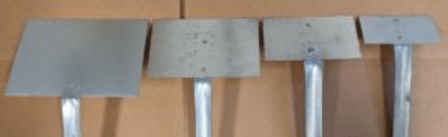 Four metal hand tools with rectangular blades, varying in size and shape, arranged against a neutral background. Ideal for construction or landscaping tasks.